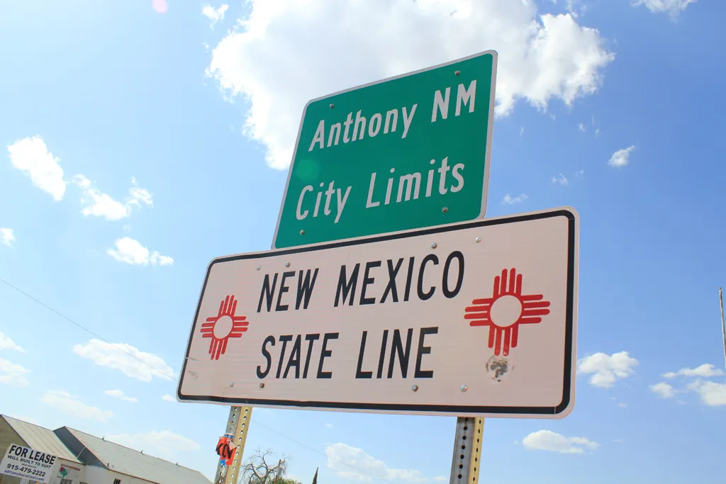 Sign that says, "Anthony NM City Limits" and "New Mexico State Line"